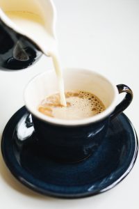 Coffee and Creamer in Black Ceramic Mug - Best Coffee Creamer